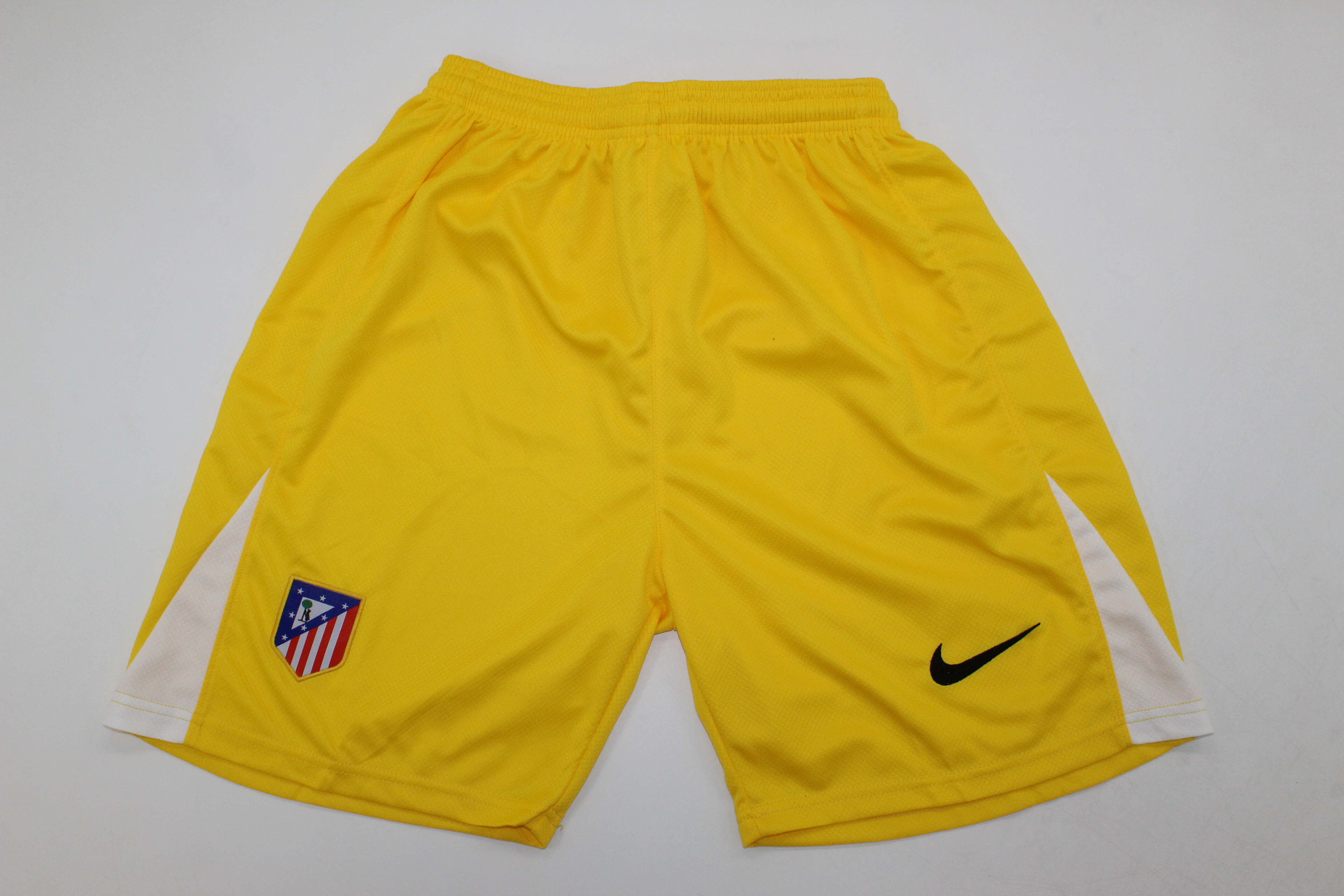 PANTALONES CORTOS ATLETICO DE MADRID AMARILLO PORTERO 25/26